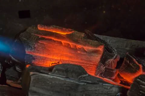 Lighting Charcoal With Propane Torch Stock Photos