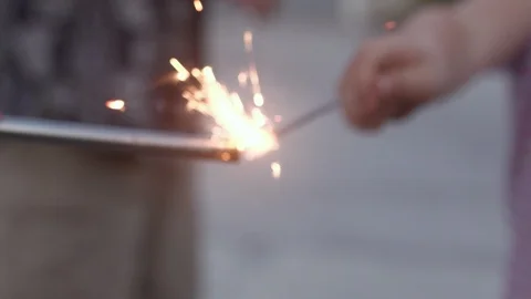 Lighting Child's sparkler 스톡 동영상 99433046