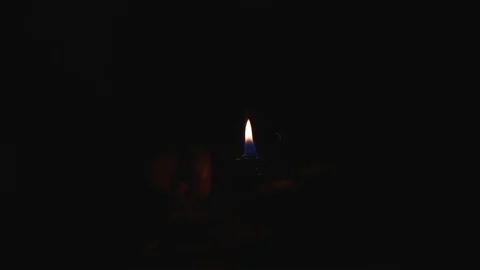 Lighting a cigarette in a dark room Stock Footage 108978229