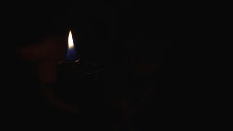 Lighting a cigarette in a dark room Video stock 108978924