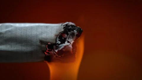 Lighting a Cigarette with Fire in Macro and Slow Motion. Stock Footage 271007701