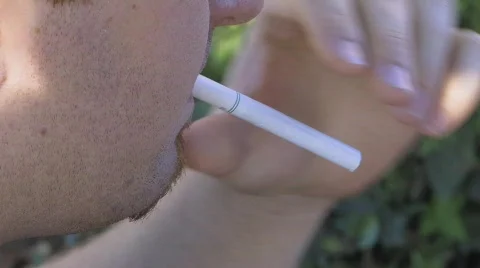 Lighting a cigarette Stock Footage 545873