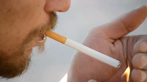 Lighting cigarette Stock Footage 24186341