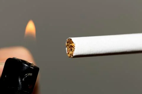 Lighting a Cigarette Stock Photos