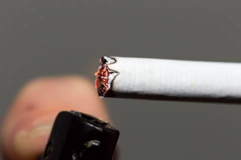Lighting a Cigarette Stock Photos