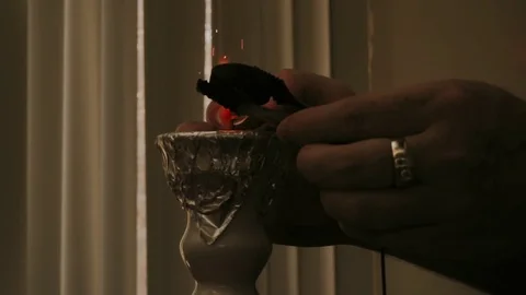 Lighting Coals Over a Hookah, Slow-Mo, Colored with Warm Deep Blacks Video stock 80438136