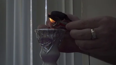 Lighting Coals Over a Hookah, Slow-Mo Video stock 80438137
