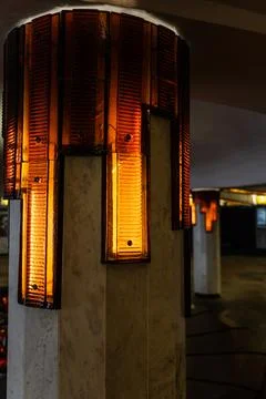 Lighting of columns in the underpass. Orange lighting. Decorative lighting Stock Photos