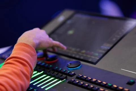Lighting console and hand of light board operator Stock Photos