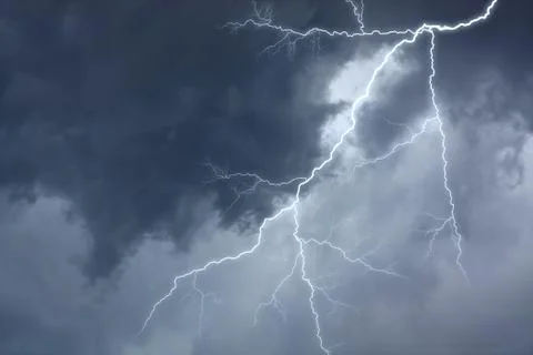 The lighting in dark stormy clouds Stock Photos