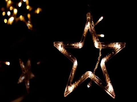 Lighting decoration with bright LED lights in the shape of a gold star. Stock Footage 129621906
