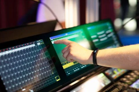 Lighting designer working with control console Stock Photos