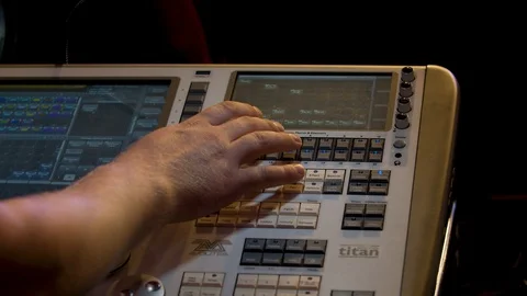 Lighting designer working on the remote Stock-Footage 106442634