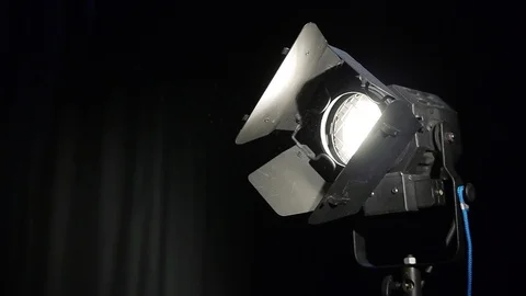 The lighting device is close-up. Dust flying in the beam of a searchlight Stock Footage 90829301