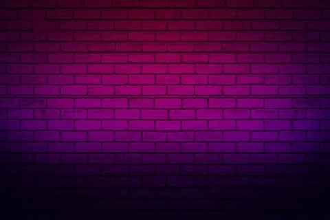 Lighting effect neon light on brick wall texture for background. Stock Photos