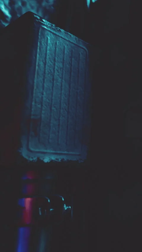 Lighting effects create a dark scene with shapes and colors in the background Stock Footage 339505938