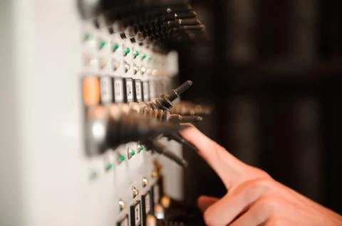 The lighting engineer adjusts the lights on stage Stock Photos