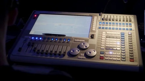 Lighting engineers desk working at live event Stock Footage 106499286