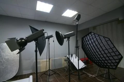 Lighting equipment in the interior studio Stock Photos