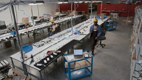 Lighting Factory Specialists Assembling Industrial Lamps in Workshop 動画素材 300140802