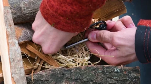 Lighting up a fire with ignition steel Video stock 273251536