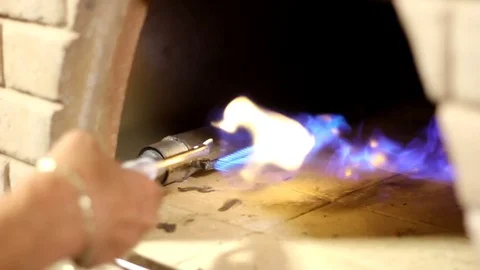 Lighting a fire oven Stock Footage 83550801