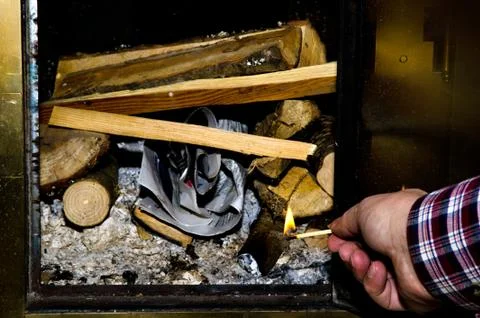 Lighting the fire Stock Photos