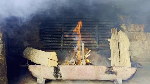 Lighting Fire in Rustic Outdoor Oven, Preparing Wood for Cooking Stock Footage 334133944