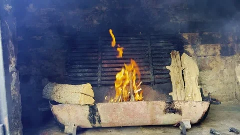 Lighting Fire in Rustic Outdoor Oven, Preparing Wood for Cooking Stock Footage 334134106