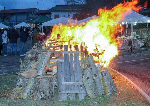 Lighting the fire in the square Christmas traditions Stock Photos