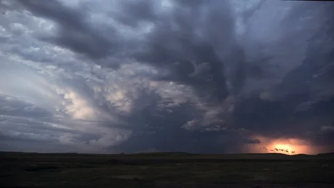 Lighting flashing during rainstorm over the landscape Stock Footage 97800523