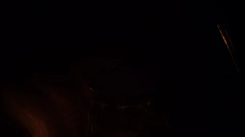Lighting a garden torch in the dark Stock Footage 96305889