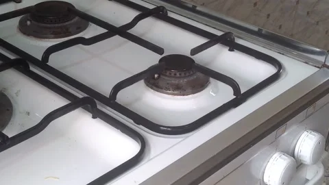 Lighting a gas oven Stockbeeldmateriaal 159310227