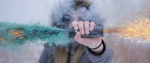 Lighting a Green Smoke Grenade Stock Footage 86662339