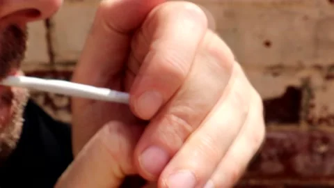 Lighting Up A Hand Rolled Cigarette 스톡 동영상 133444759