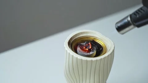 Lighting incense charcoal in modern ceramic burner Stock-Footage 336763575