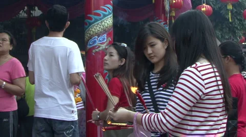 Lighting Incense Outside The Temple 스톡 동영상 1080373