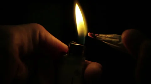 Lighting a joint in the dark Stock Footage 39704623