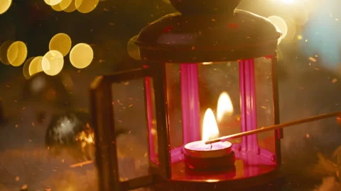Lighting the lantern on Christmas Eve Stock Footage 320290457