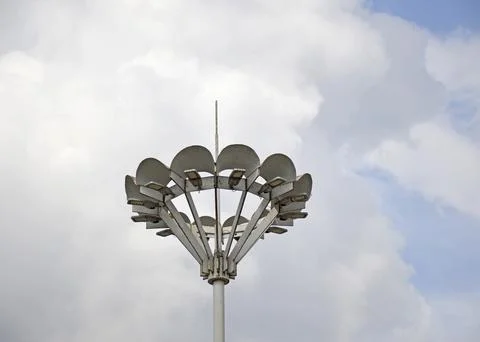 Lighting lantern with many light bulbs against the backdrop of a large cloud Stock Photos