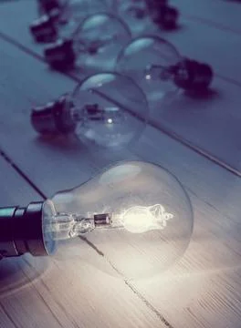 Lighting light bulb on floorboard Stock Illustration