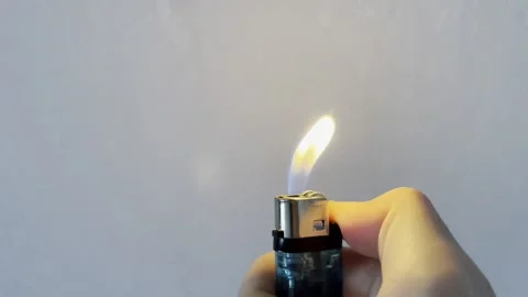 Lighting a lighter Stock Footage 165139827