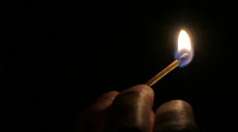 Lighting match on black background, 4k Stock Footage 60743992