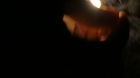 Lighting match on black background, 4k Stock Footage 60744041