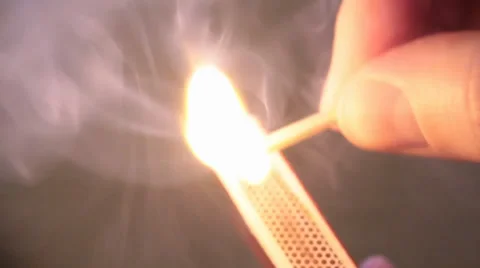 Lighting Match in Close Up Stock Footage 34480709