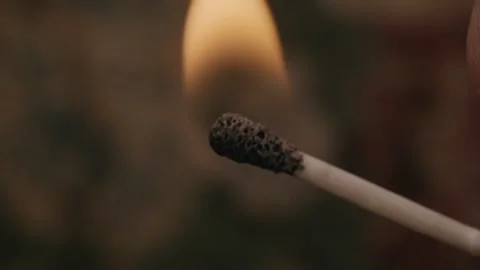 Lighting a match close up Stock Footage 339843187