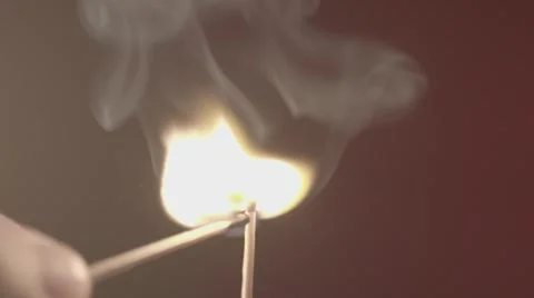 Lighting a match, close up, slow motion Stock Footage 56777888