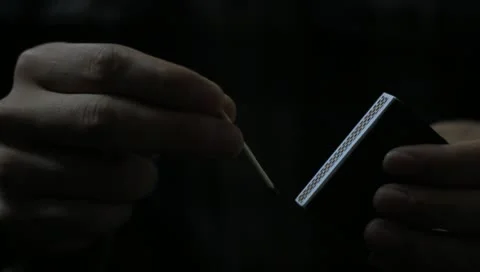 Lighting a match Stock Footage 10791537