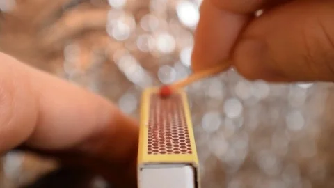Lighting a match Stock Footage 72979168