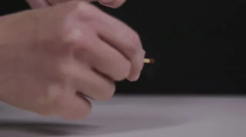 Lighting a match in slow motion, black background Stock Footage 58761283